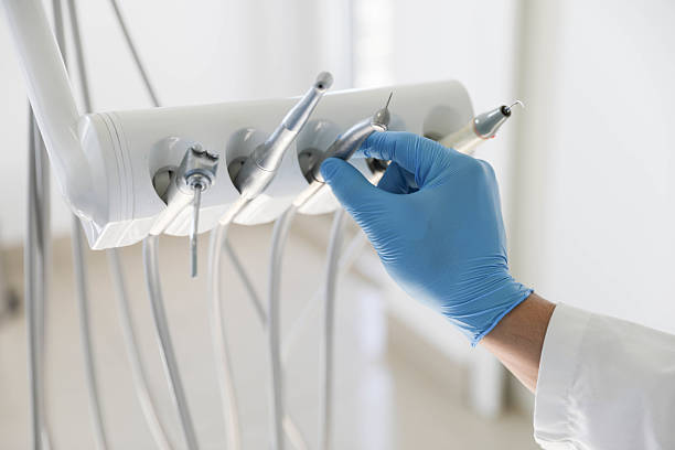 Professional Tooth Extraction technician working in Galesburg, IL